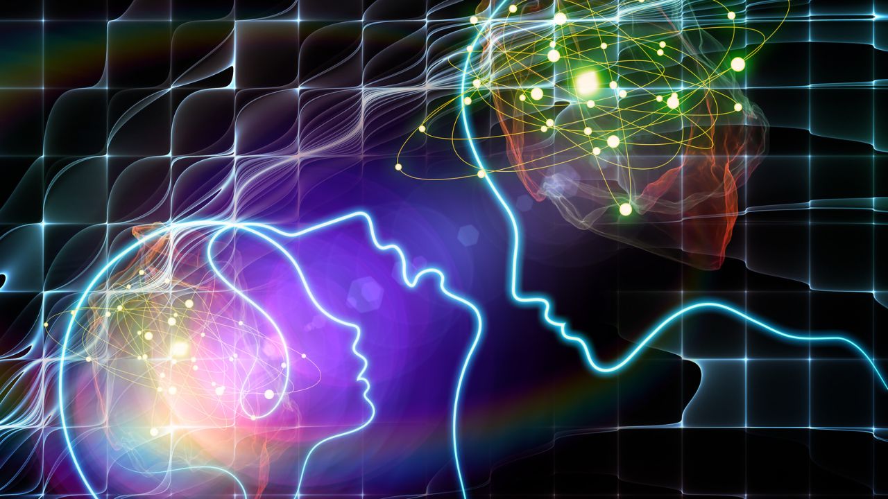 Digitally created image of two people communicating telepathically in a dreamlike setting.